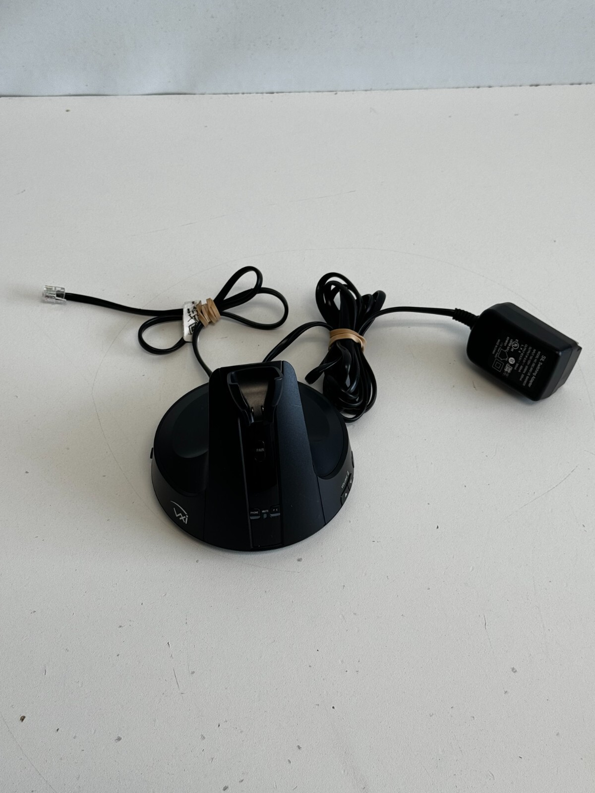 ZZ11:  VXi V200 Wireless Headset Desktop Charging Base Stand