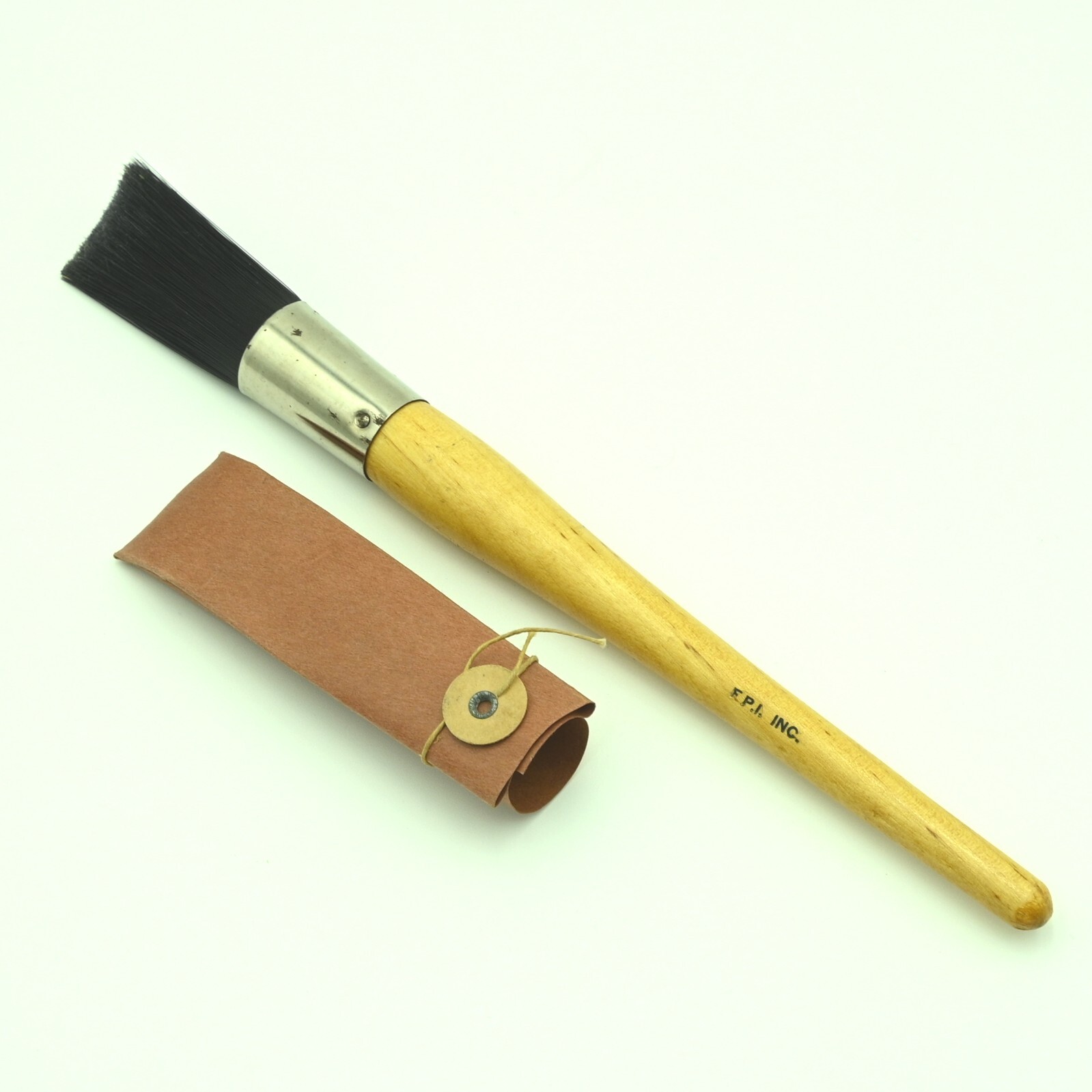 F.P.I. Paint Brush 1in 8020-263-3873 Wooden Handle Metal Ferrule Paper Cover