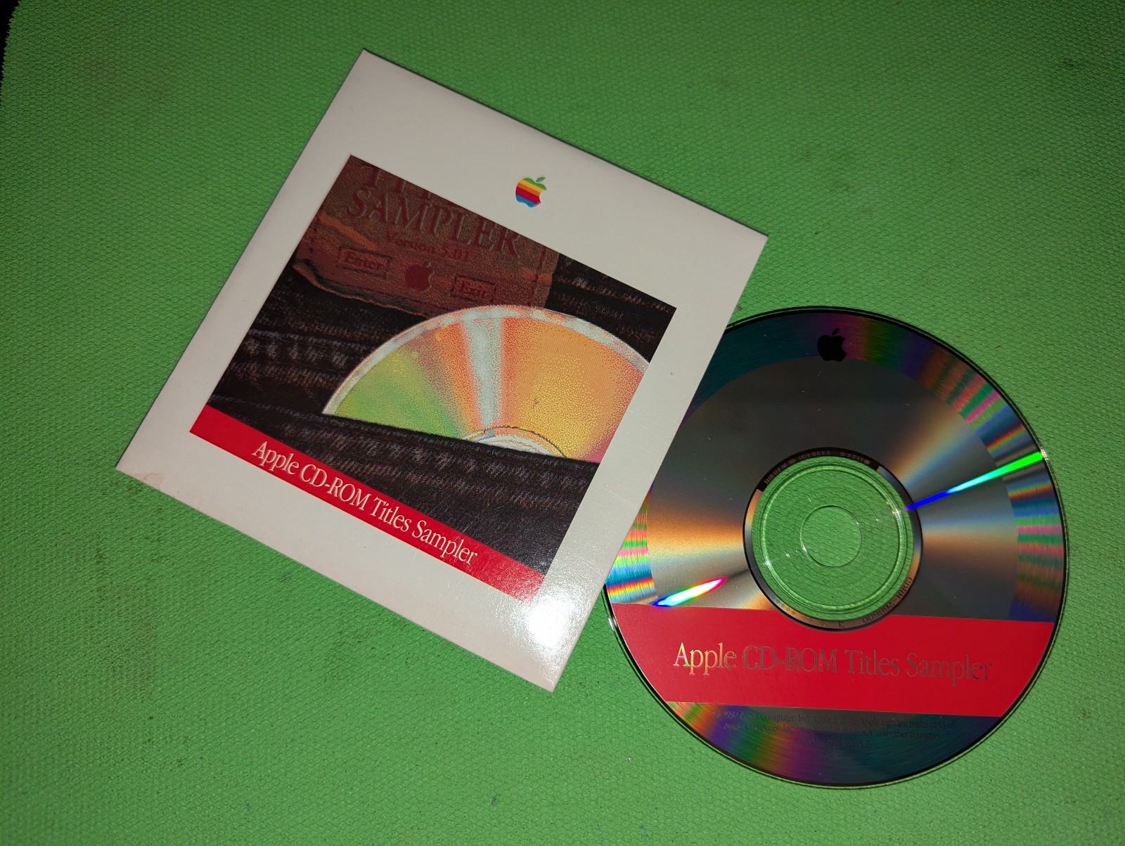2x Apple CD-ROM Titles Sampler - one shrinkwrapped, one open
