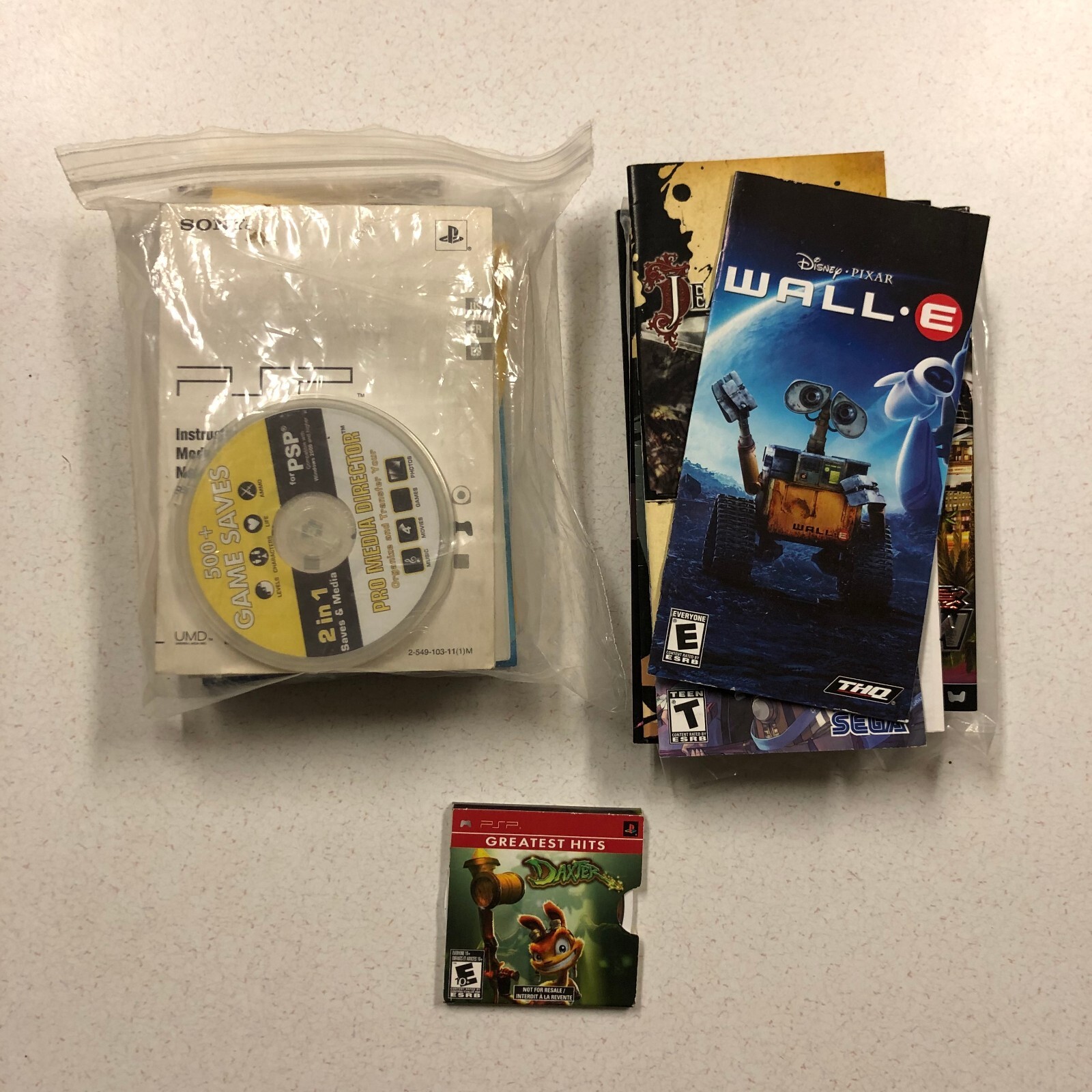 Lot of Sony PSP Instruction Manuals & Booklets + Daxter Demo + PC Software