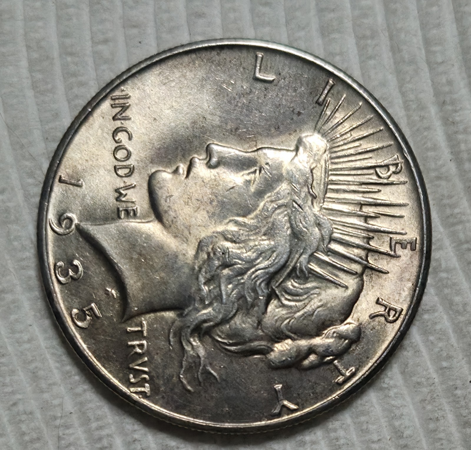 1935 P Peace Silver Dollar. Estimated Almost Uncirculated 58. A0989.