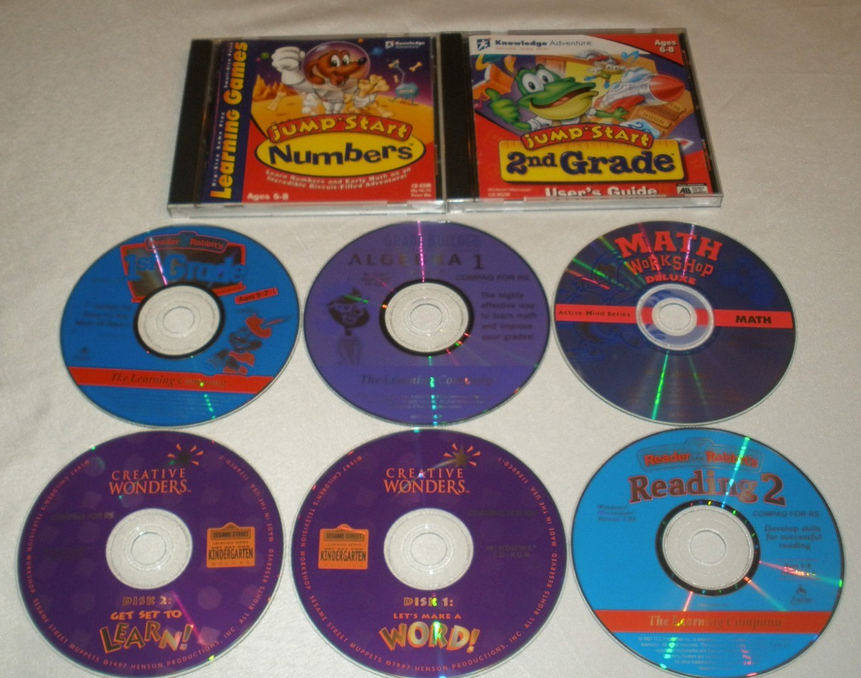 Lot of 8 Learning CDs Jump Start Math Workshop Creative Wonders Reader Rabbit's