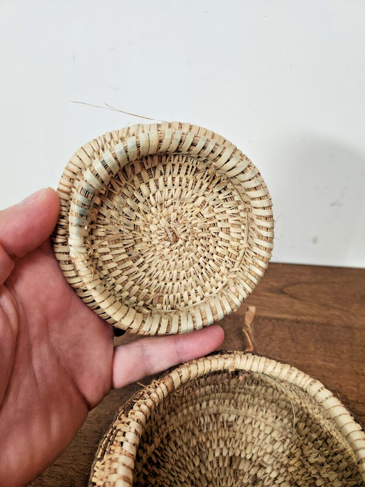 ANTIQUE OMANI BEDOUIN WOVEN LIDDED BASKET WITH LEATHER