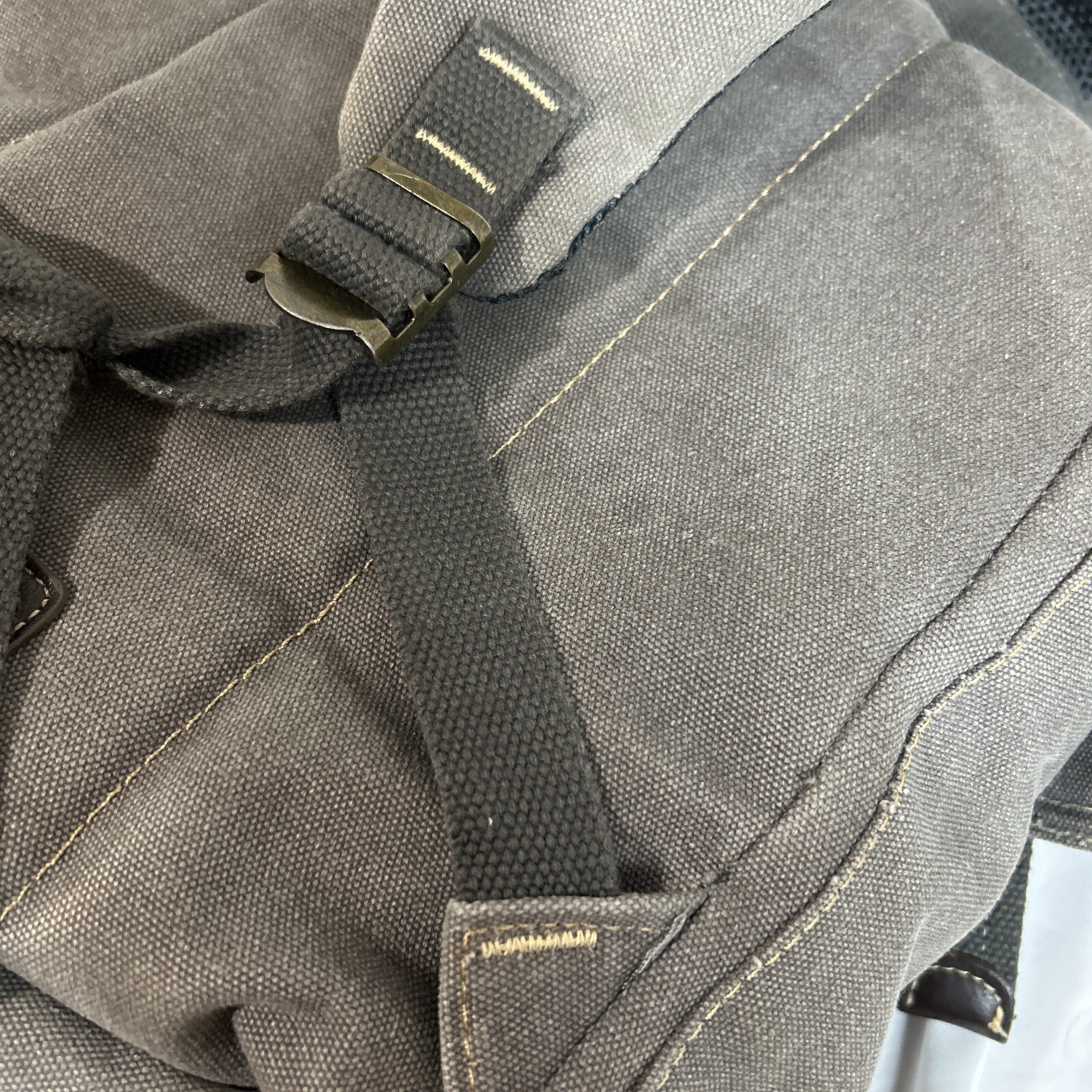 Cargoit Gray Canvas Backpack Magnetic Closures Pockets Straps and A Deep Inside