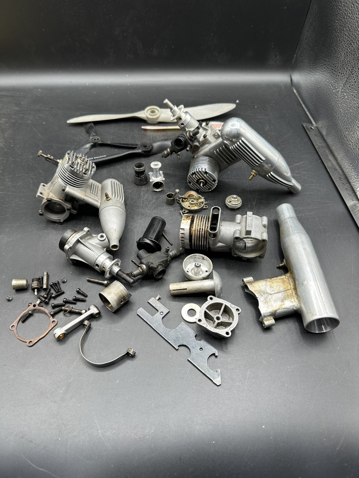 Lot Of Vintage Model Airplane Motor Parts Etc.