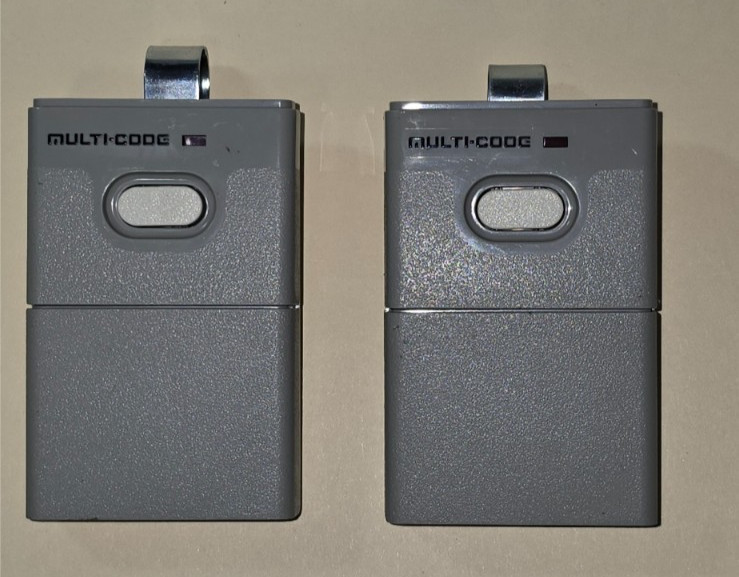Lot of 2 - Linear Multi-Code 308911   1 Button Remote Transmitter Gate Openers