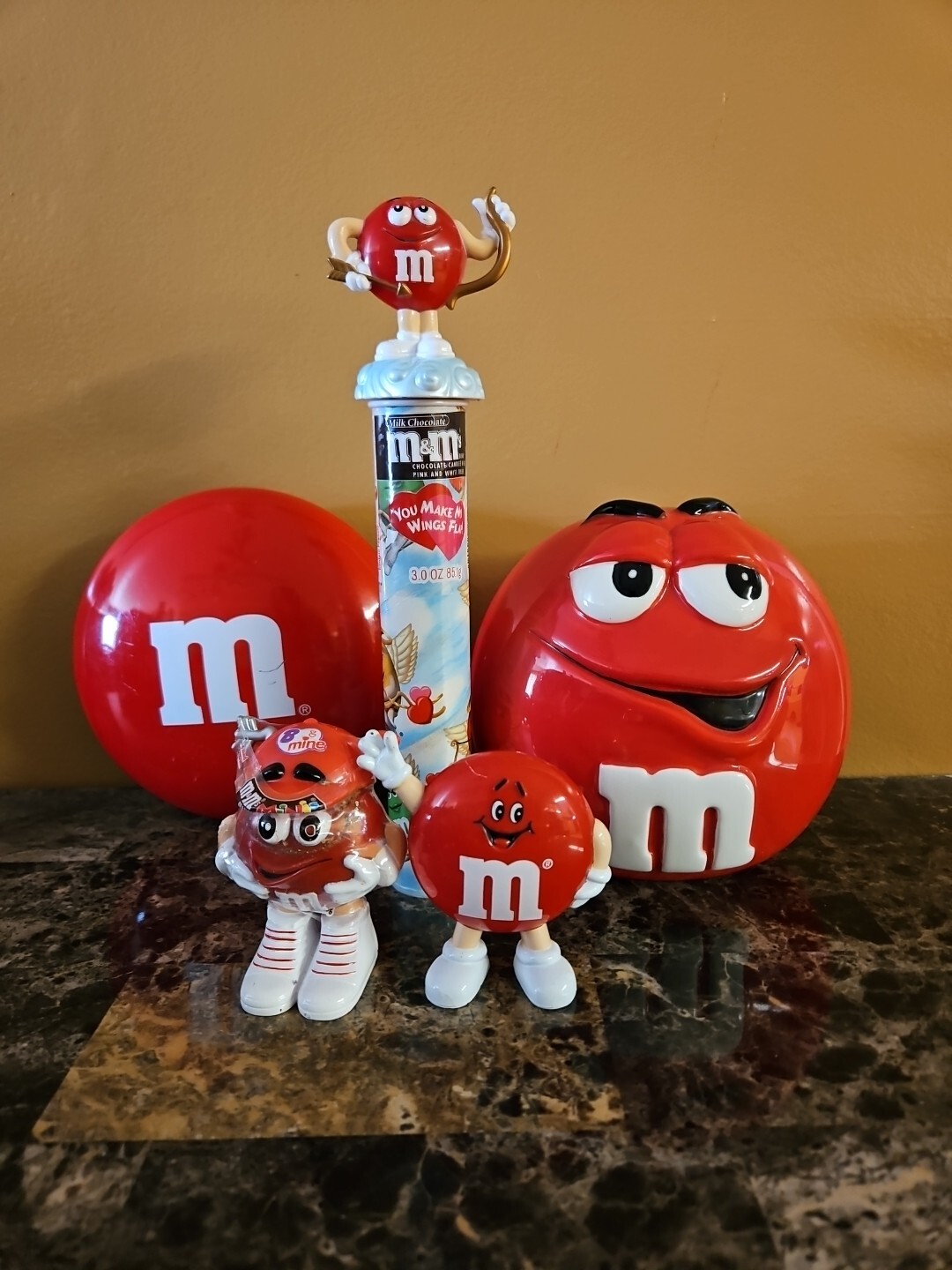 5 PIECE VINTAGE RED M&M CANISTER W/ LID , TIN BOX, TWO MINIS AND A DSPENSER