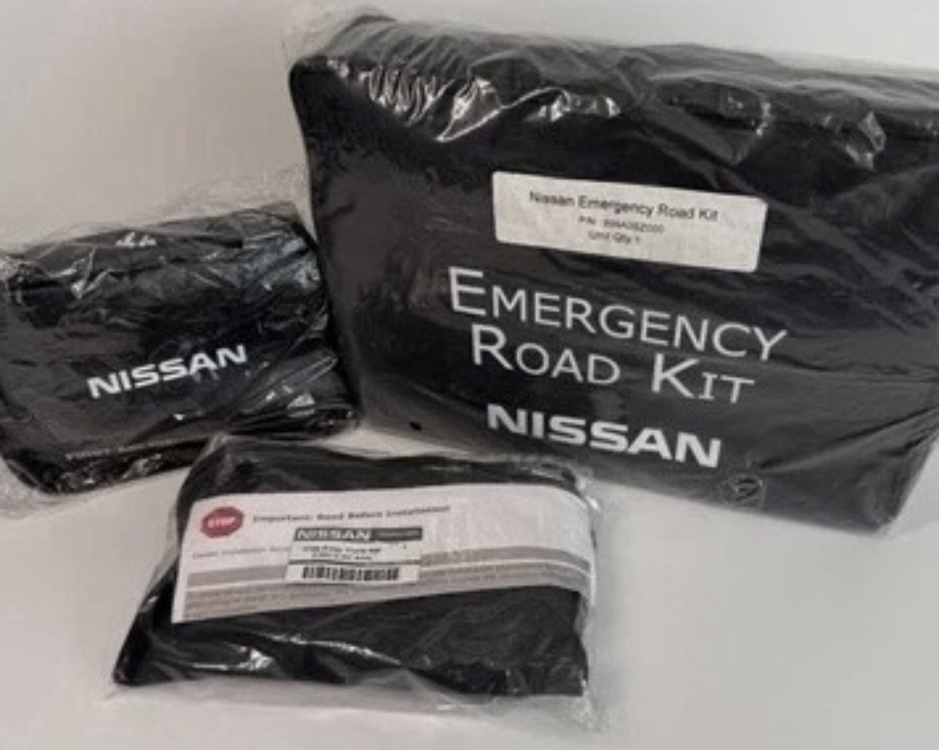 Nissan Emergency Road Kit / First Aid Kit / Hide Away Trunk Net OEM NOS