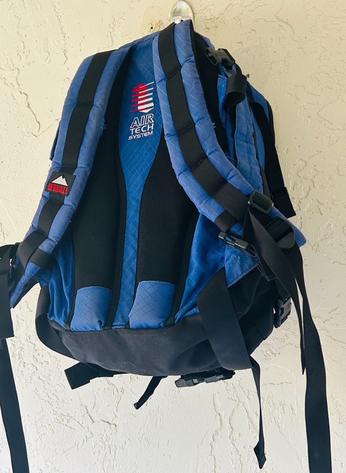 McKinley Hiking Camping Storm Control Backpack (Blue, Red and White)