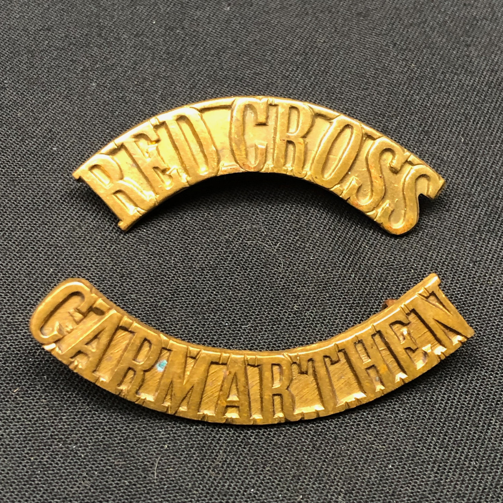 Original WW1/WW2 British Army Red Cross Carmarthen Brass Shoulder Title Set
