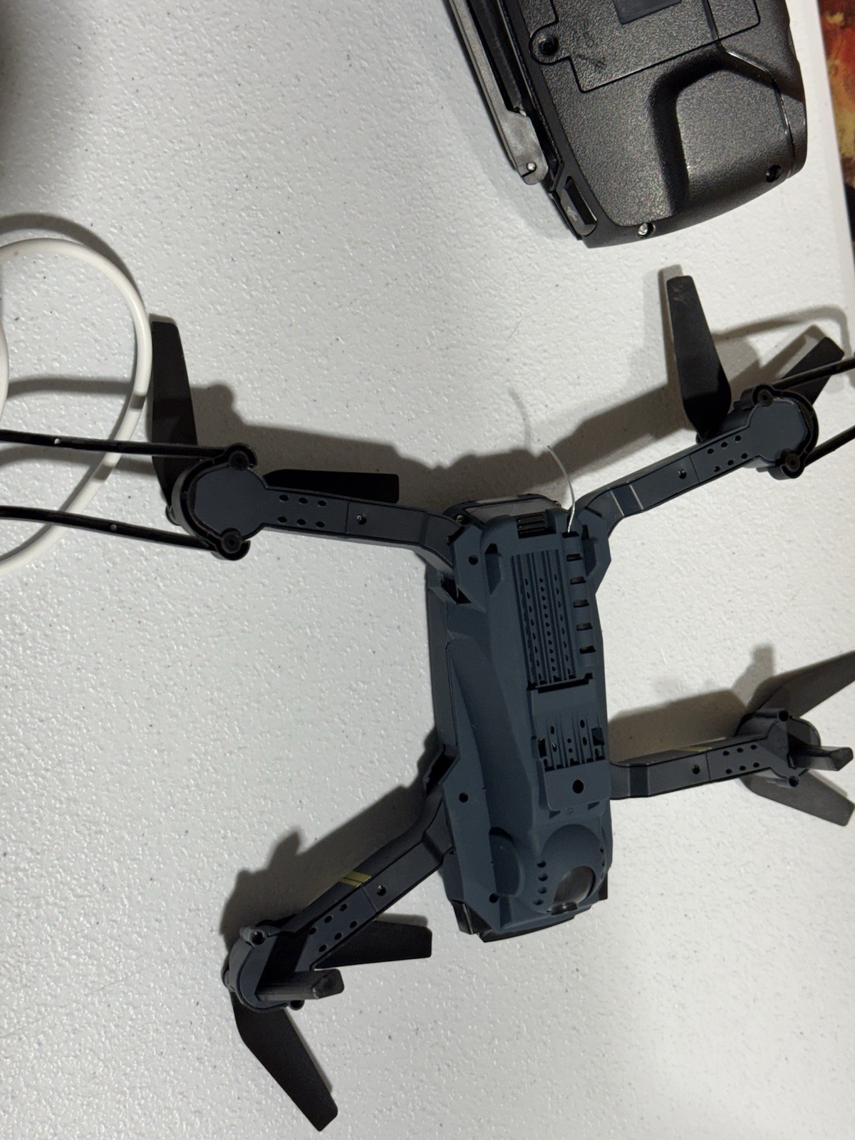 Foldable Drone with Remote Control and Charging Cable