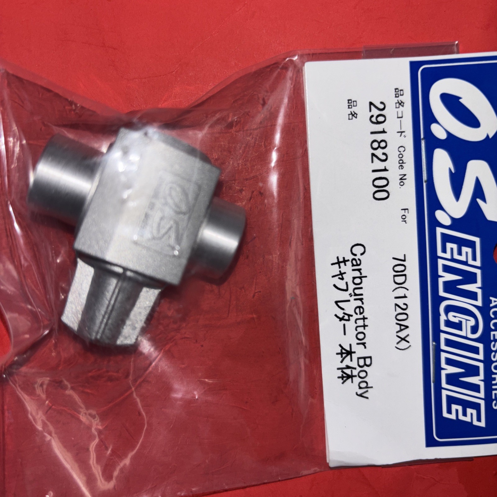 OS 120  AX CARB HOUSING 70D NIP