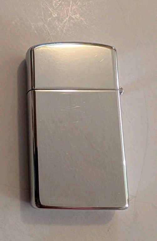 SPERRY I984 ZIPPO SLIM LIGHTER