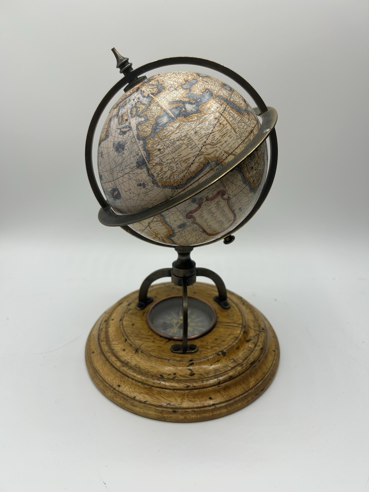 Authentic models vintage style globe with built in compass. 6” wide, 9” high
