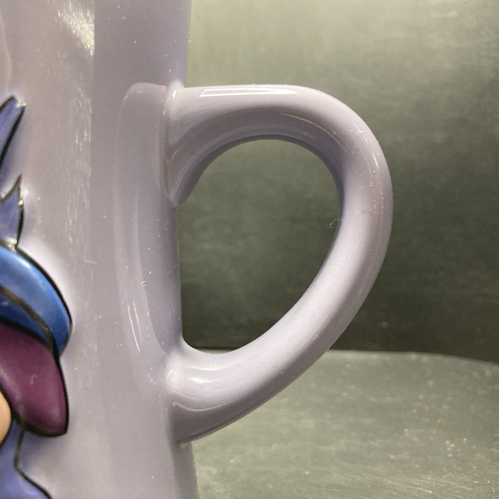 Disney Store Eeyore Bursting Through a Wall LARGE Purple Embossed Ceramic Mug