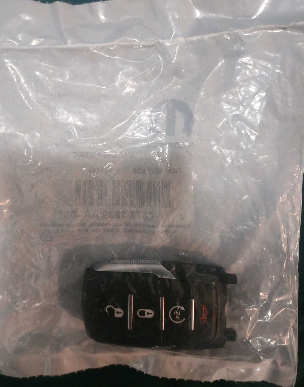 Integrated Key Fob Transmitter - Mopar (68731639AA)