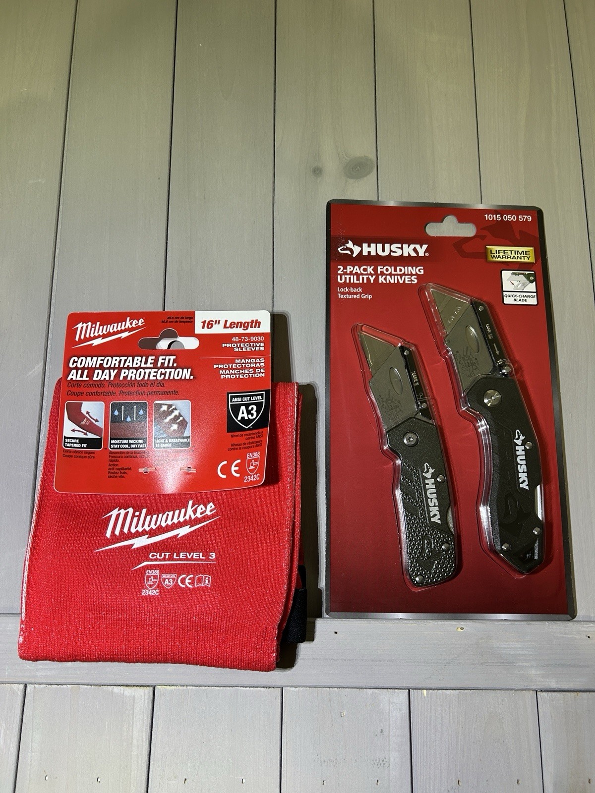 Milwaukee Arm Sleeves  And Husky 2 Pack Folding Utility Knives