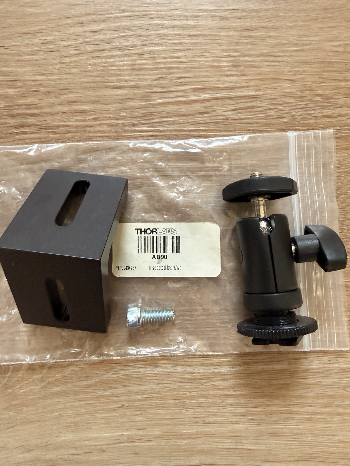 Thorlabs AB90 90° Angle Bracket bundled with a mini ball head camera mount