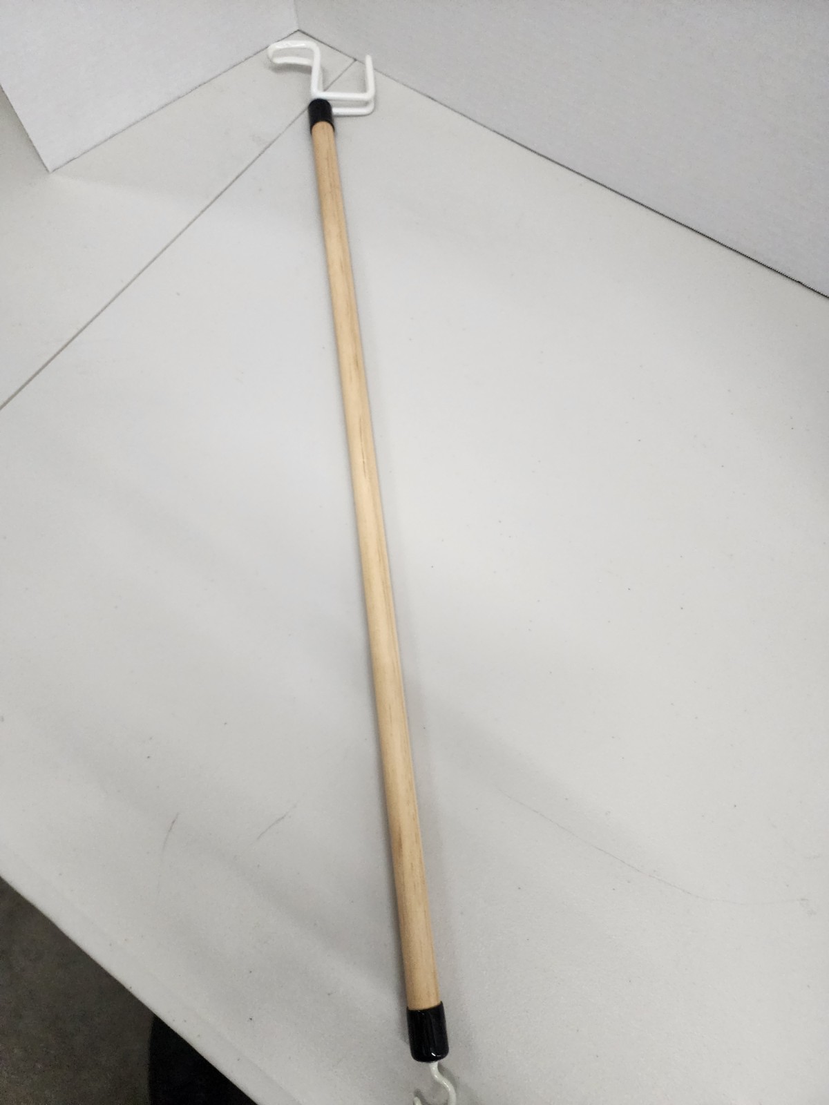 Essential Medical Supply Wooden Dressing Stick, a 27-inch long assistive