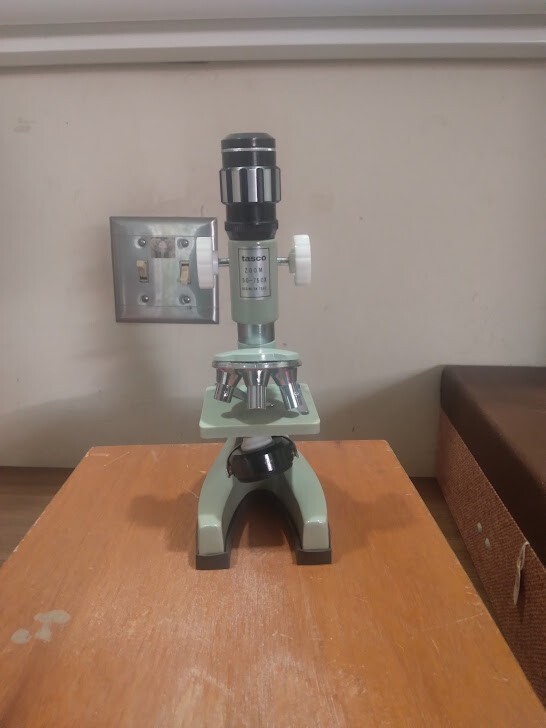 Small microscope kit with tools, slides, and case