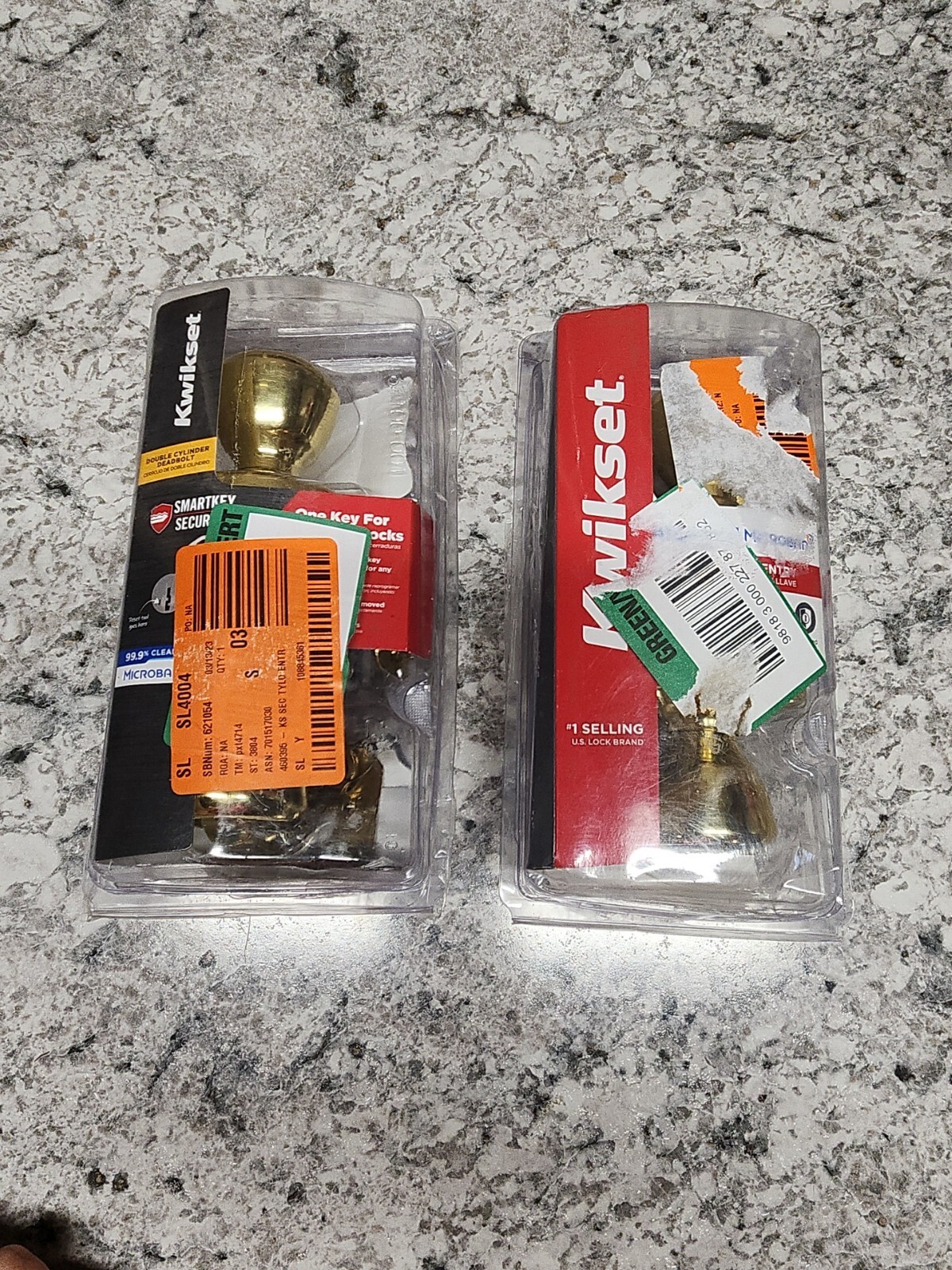 Kwikset Tylo Polished Brass entry door knob