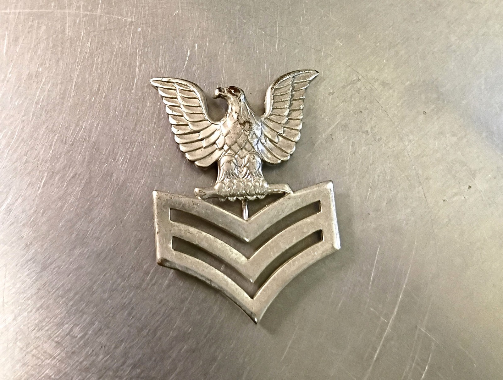 US Navy USN E-6 Petty Officer First Class Cap Device Silver (#2) Stamped KREW