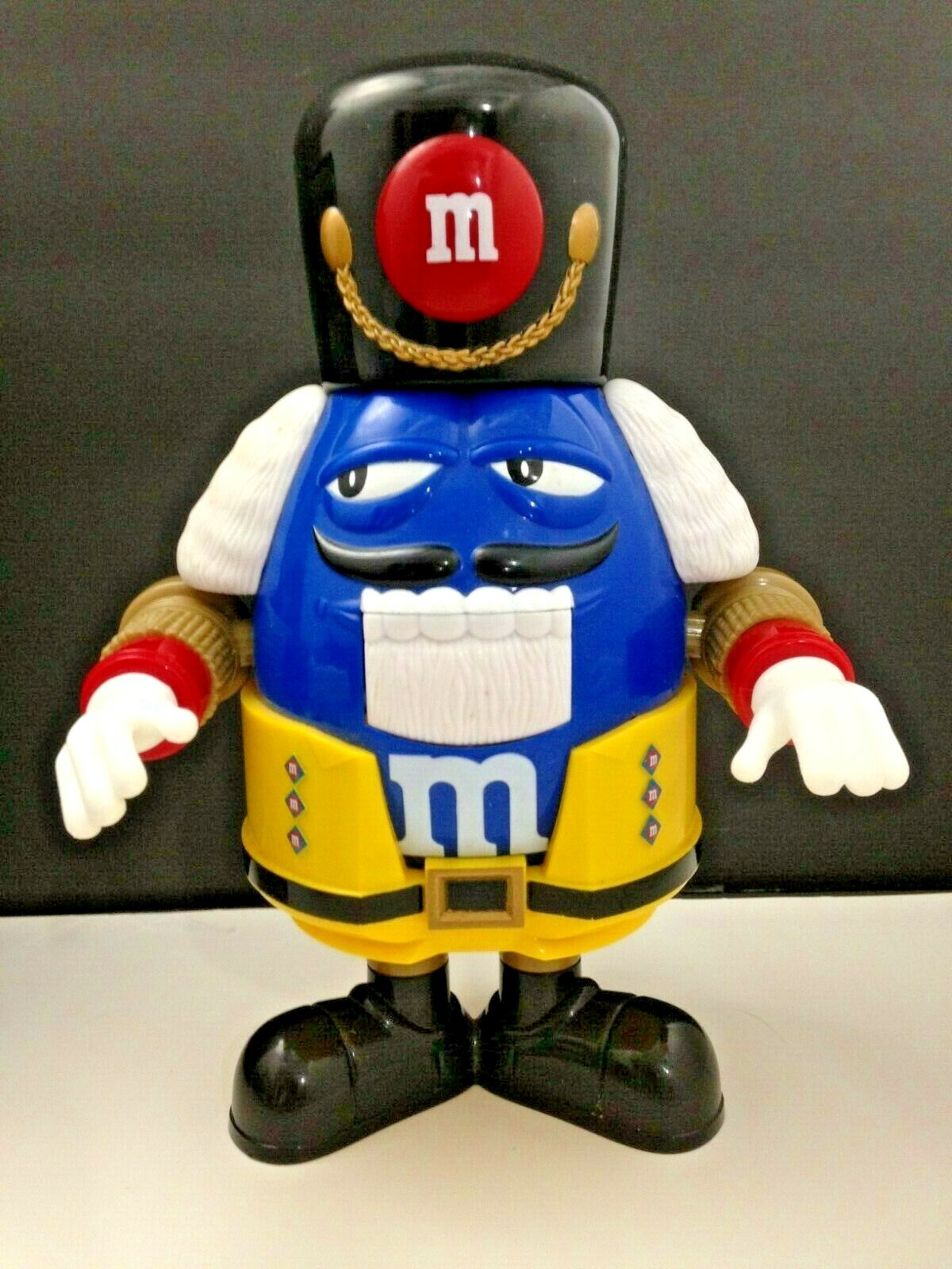 Blue M & M Candy Dispenser Nutcracker Toy Soldier Yellow Uniform 10" tall