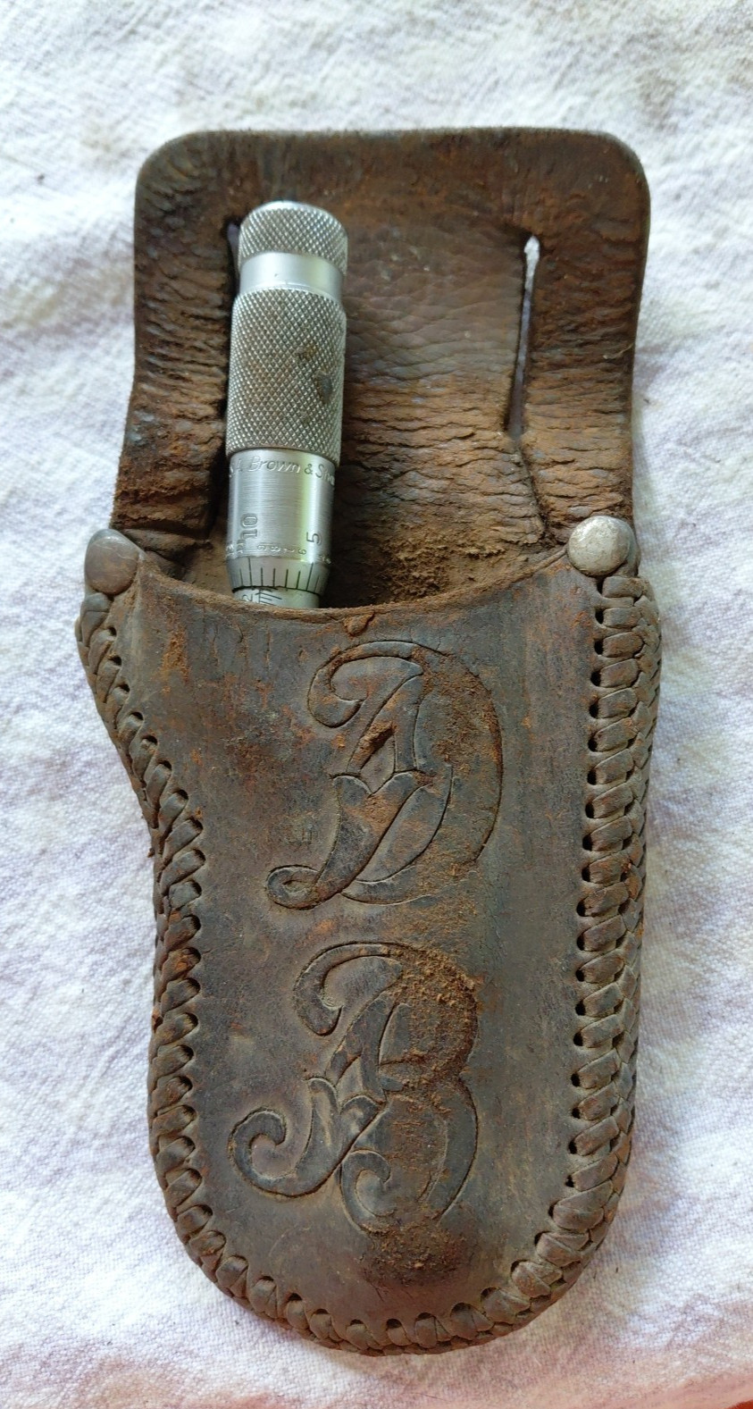 brown sharp micrometer and leather pouch