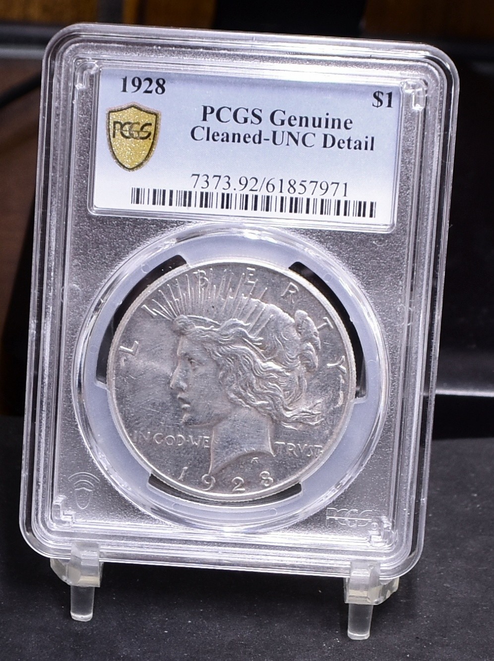 1928 Peace Dollar - PCGS Unc Details, Cleaned  (#62429-L)
