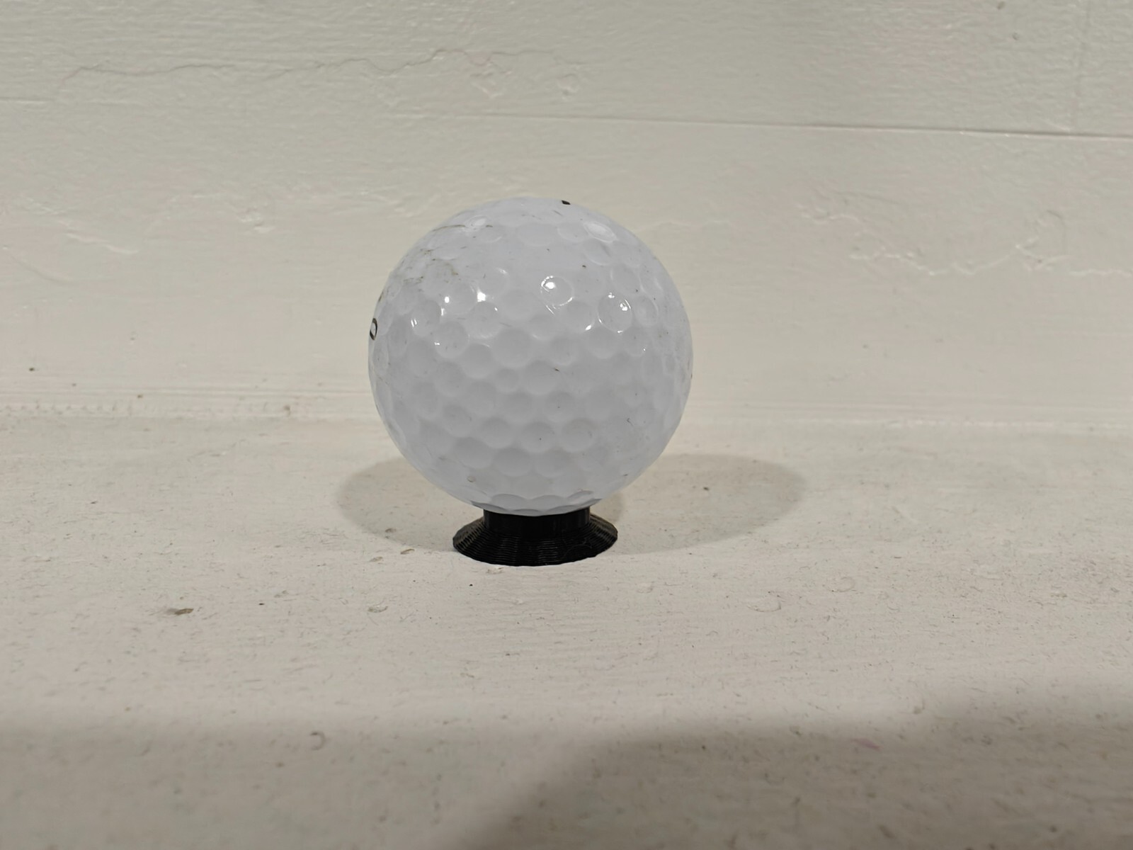 25 pack of black single use Golf Range Simulator Tees - Black