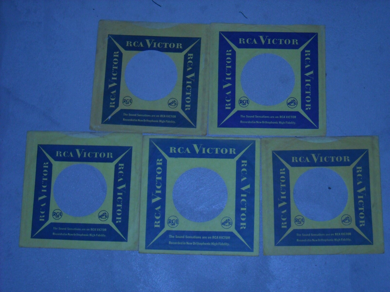 45RPM COMPANY SLEEVES.  LOT OF FIVE "CLEAN" BLUE & YELLOW.  RCA. 1960-