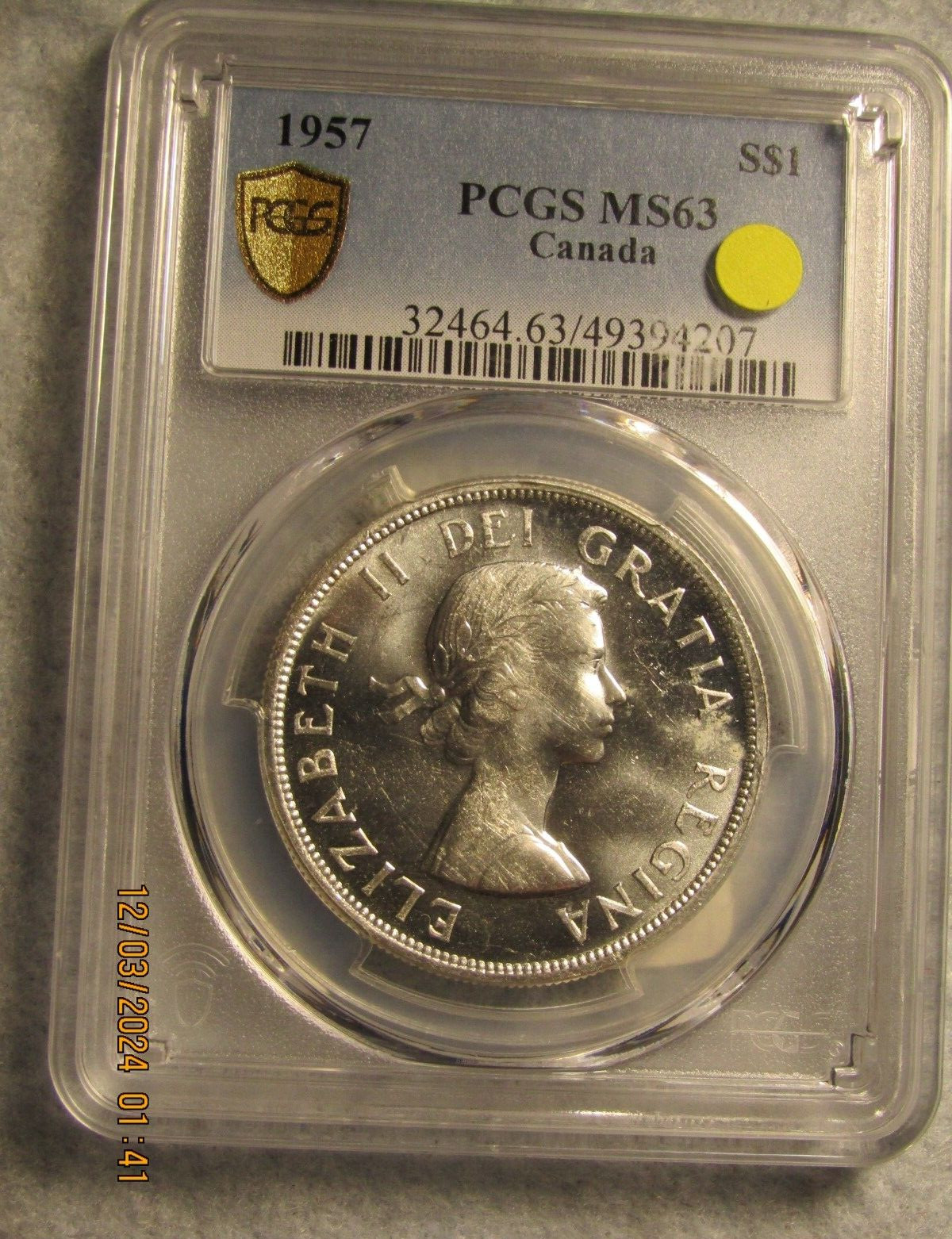 1957 CANADA SILVER $1 DOLLAR...PCGS MS-63..GOLD SHIELD