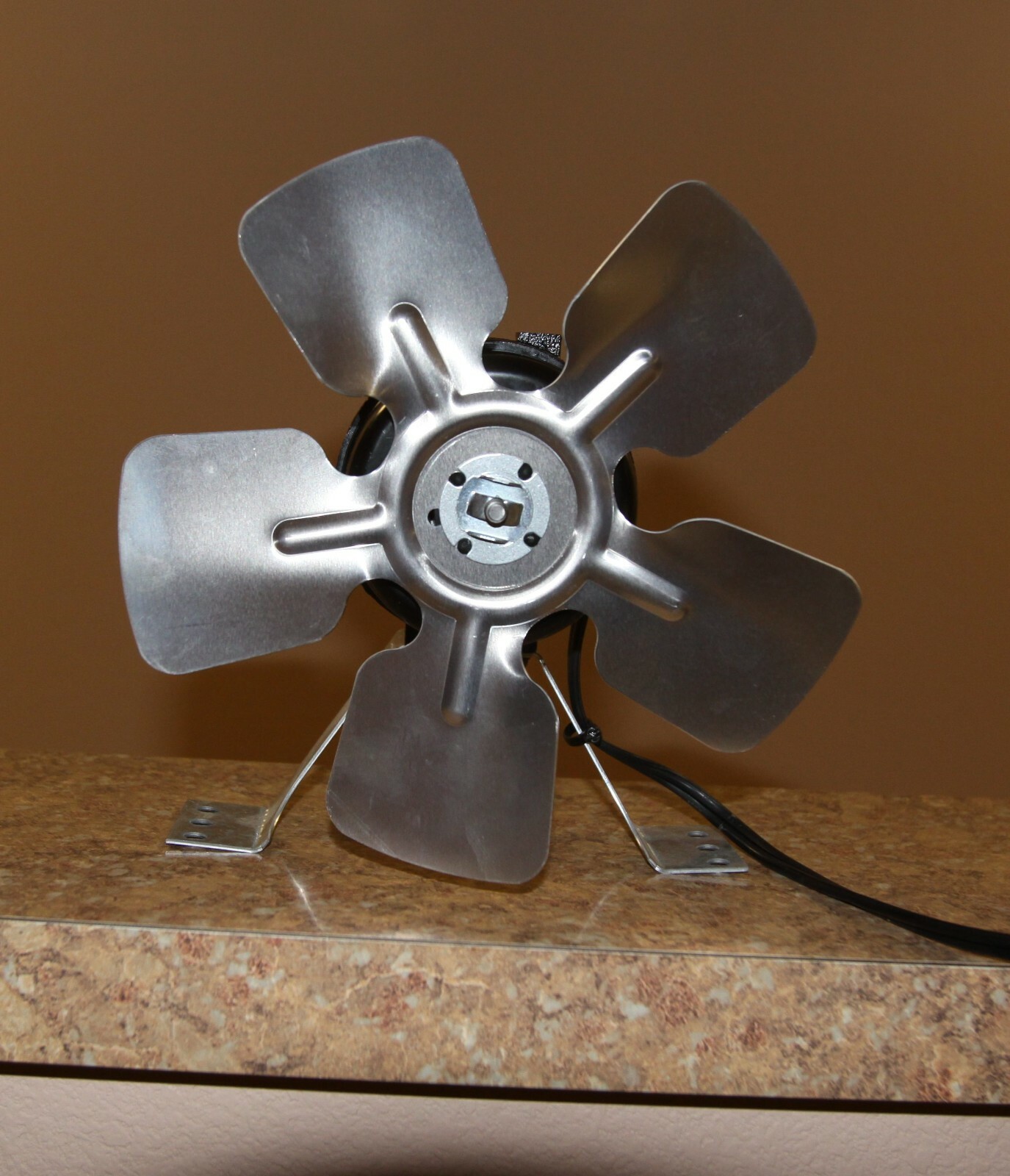 Older soda vending machine condenser fan motor, blade & bracket assembly