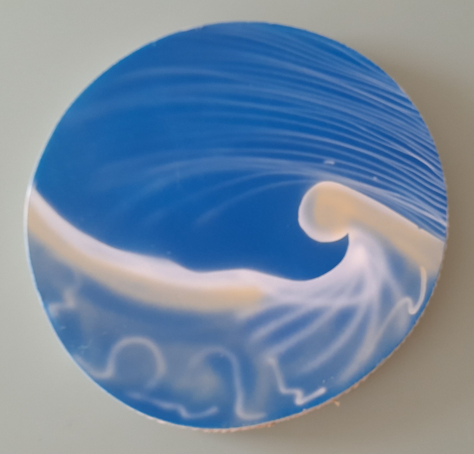 Ocean drum (Wave-painted skin drum filled with rice to make sea/rain sounds)