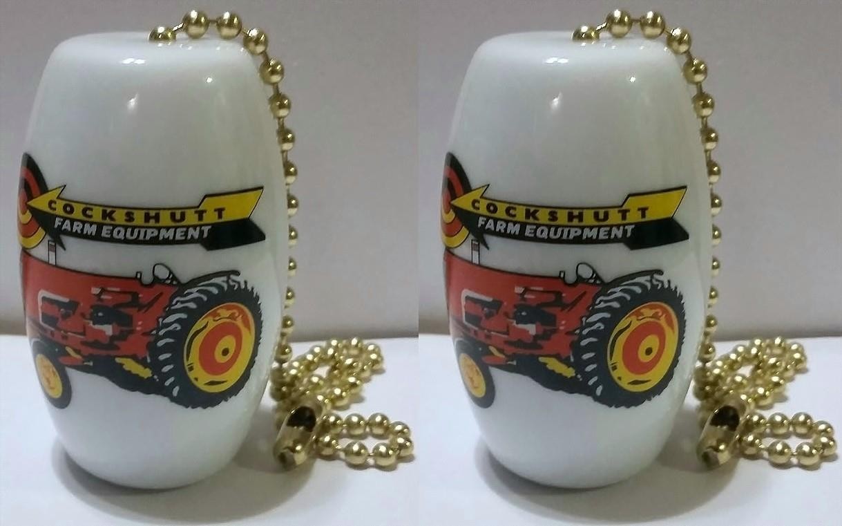 A Charming Set of 2 Cockshutt Tractor Ceiling Light/ Fan Pulls