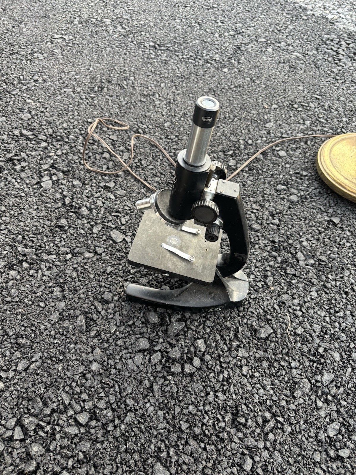 This is a vintage Wolfe student microscope likely imported from Japan,