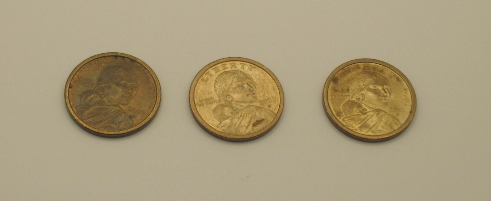 Dollar Coins. 3 Sacajawea Coins
