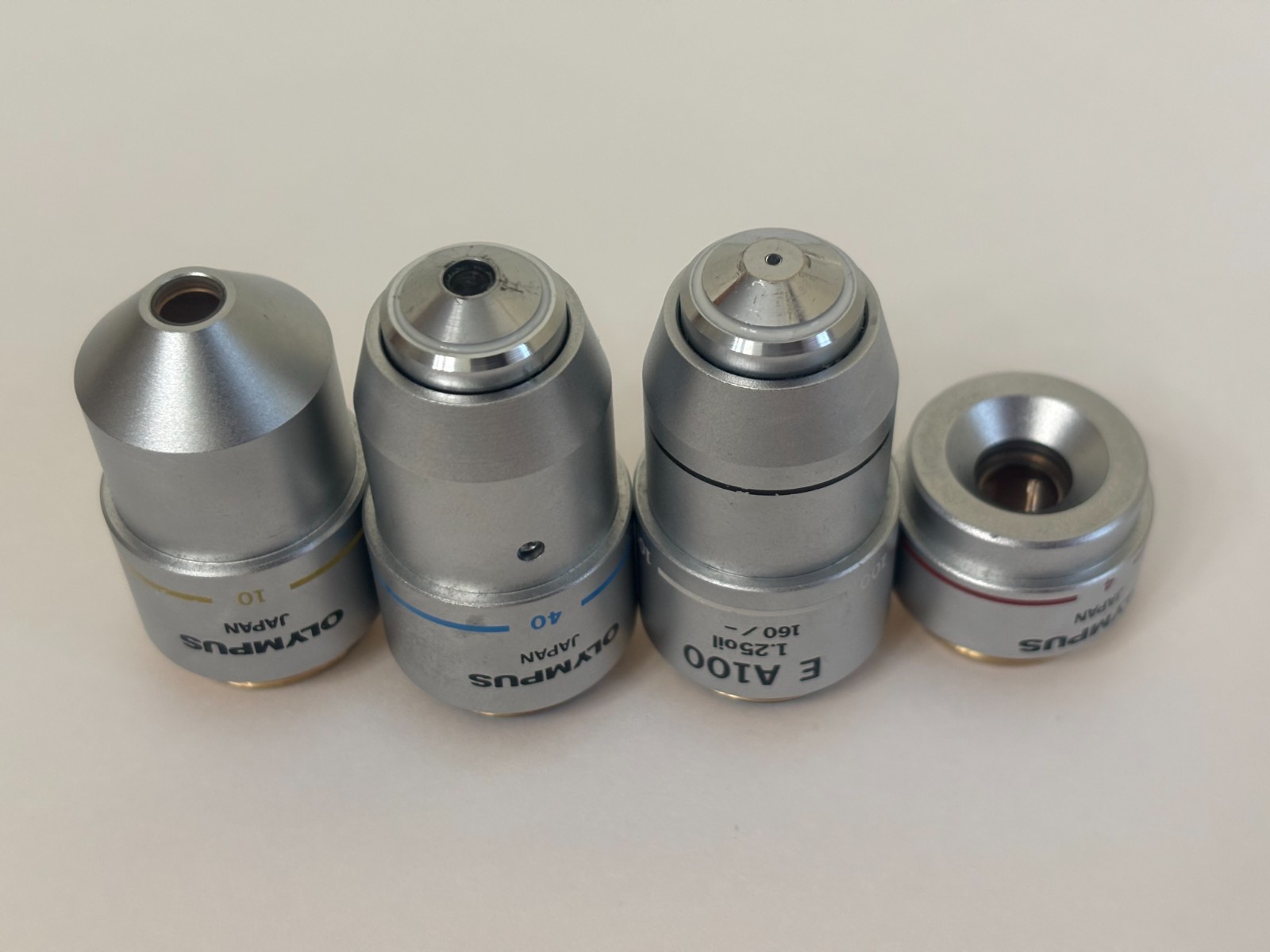 Olympus CH2 Four Microscope Objectives E A4, E A10, E A40, E A100 Oil