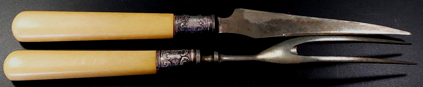 Vintage 8.5" Knife and Fork set with off white handles!