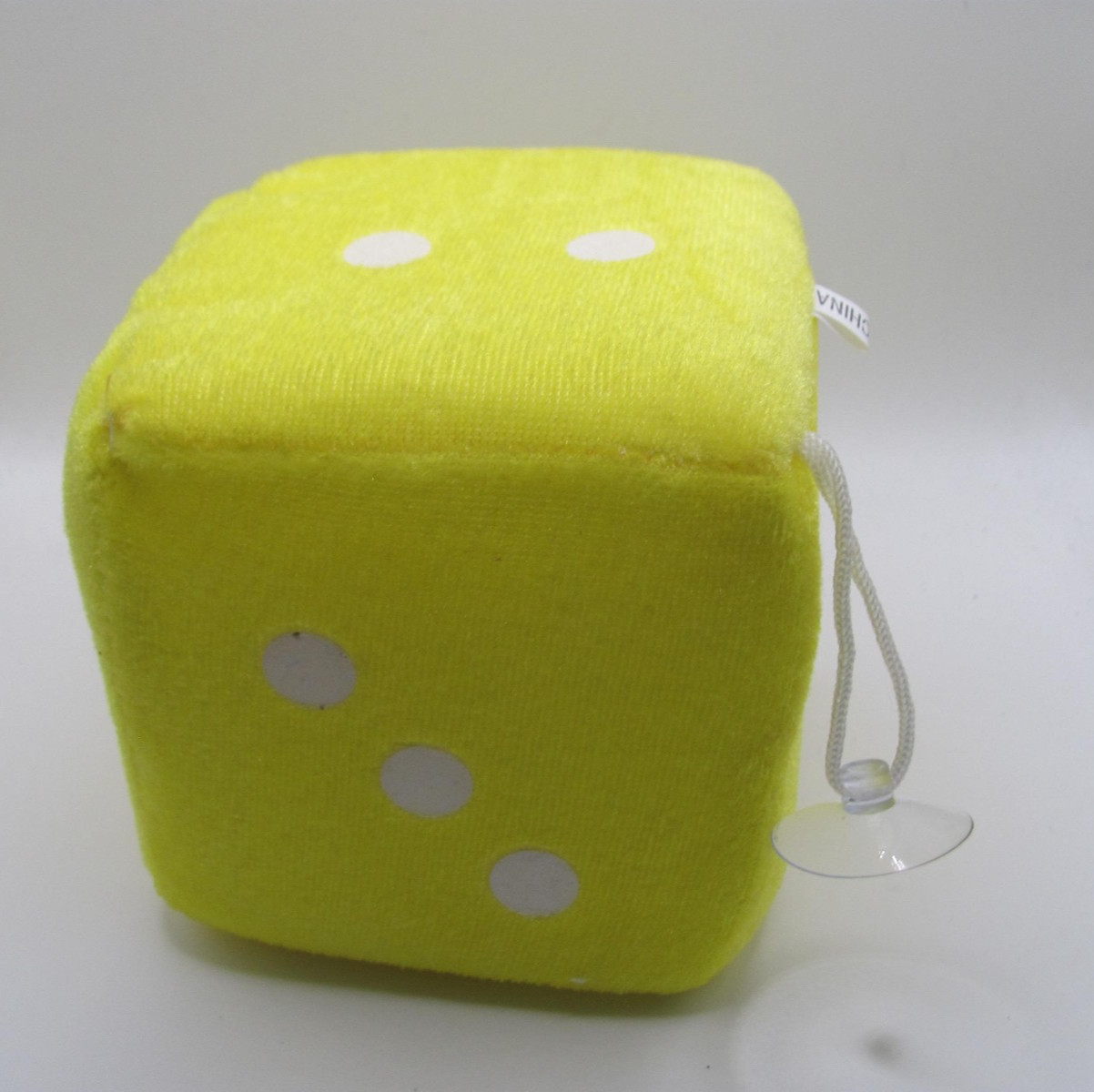 4" IN DIAMETER YELLOW DIE W/ SUCTION CUP AND WHITE CIRCLES
