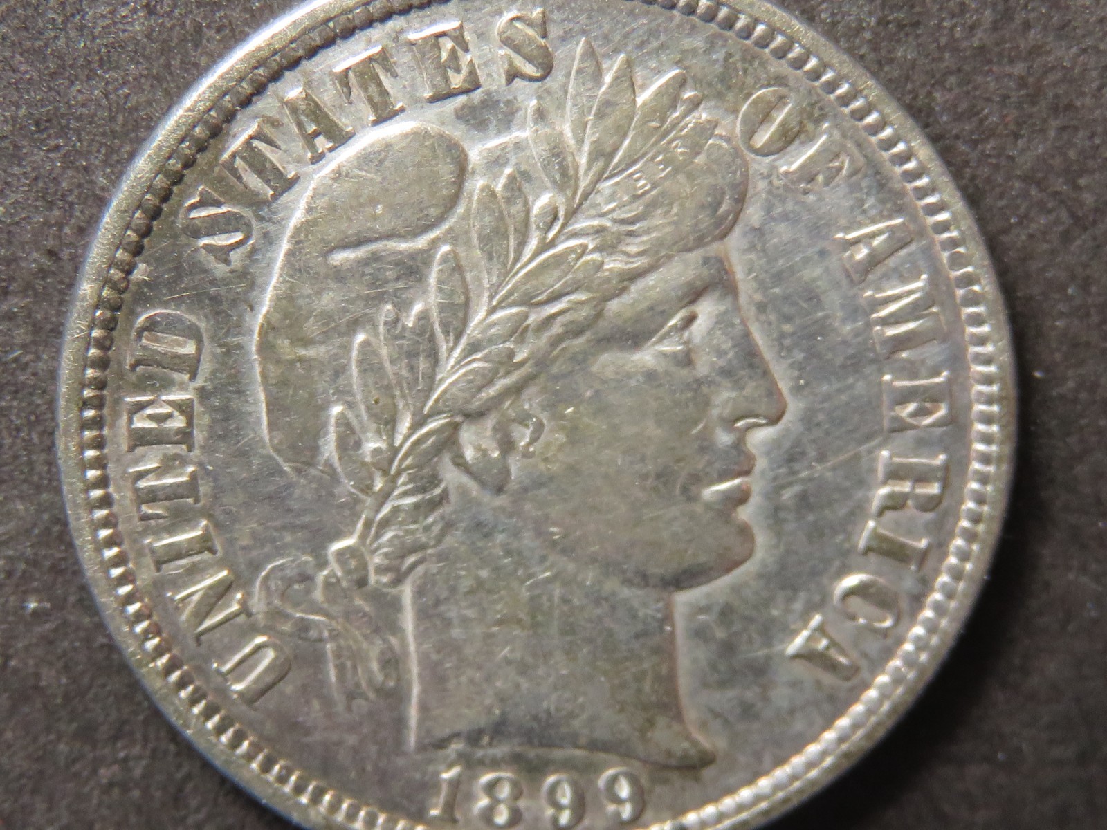 1899-P Barber Dime Grading AU/Unc.