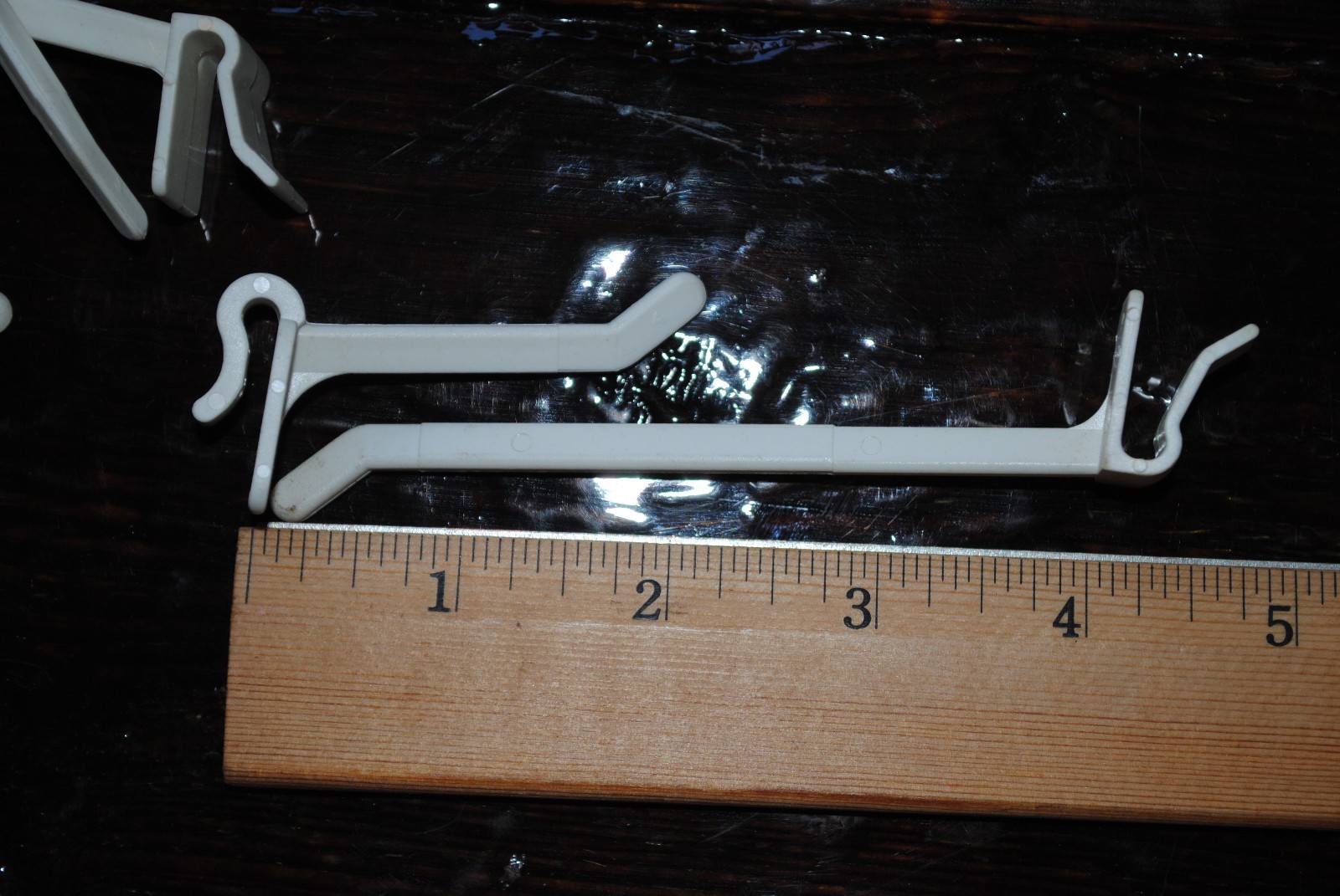 25 Plastic Snap Snap-On Peg Hook - 4" white cardboard counter wire rack display