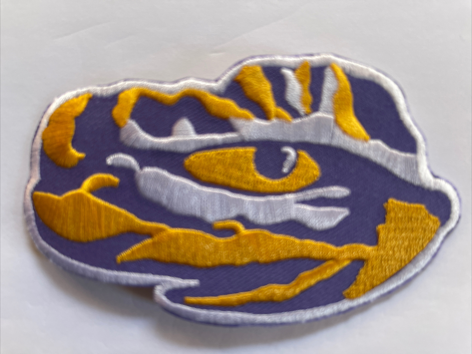 LSU Tigers Eye of the Tiger vintage iron on patch new old stock 4" x 2.5" A1