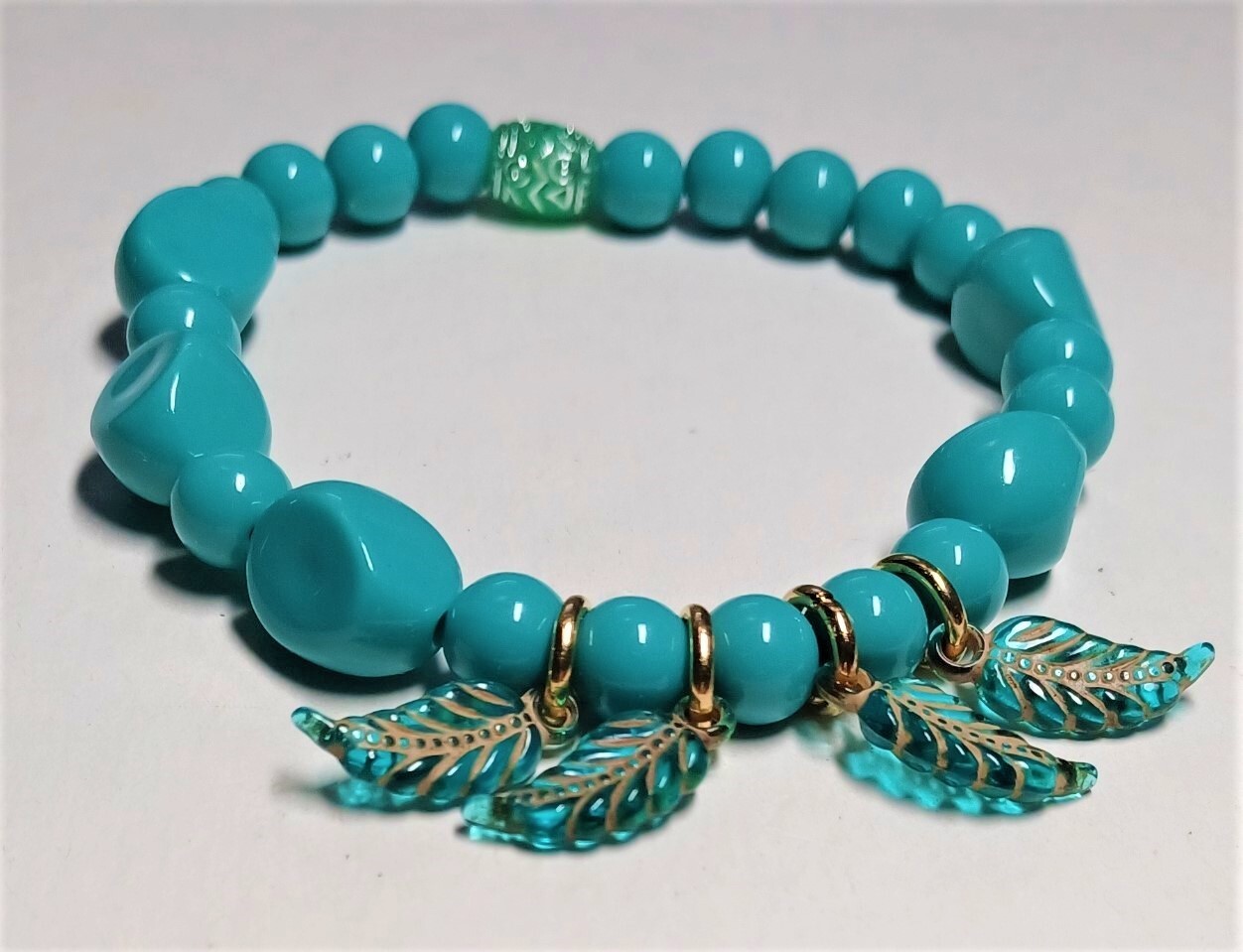 Fashionable Chic Teal Beaded Bracelet - Leaf Charm