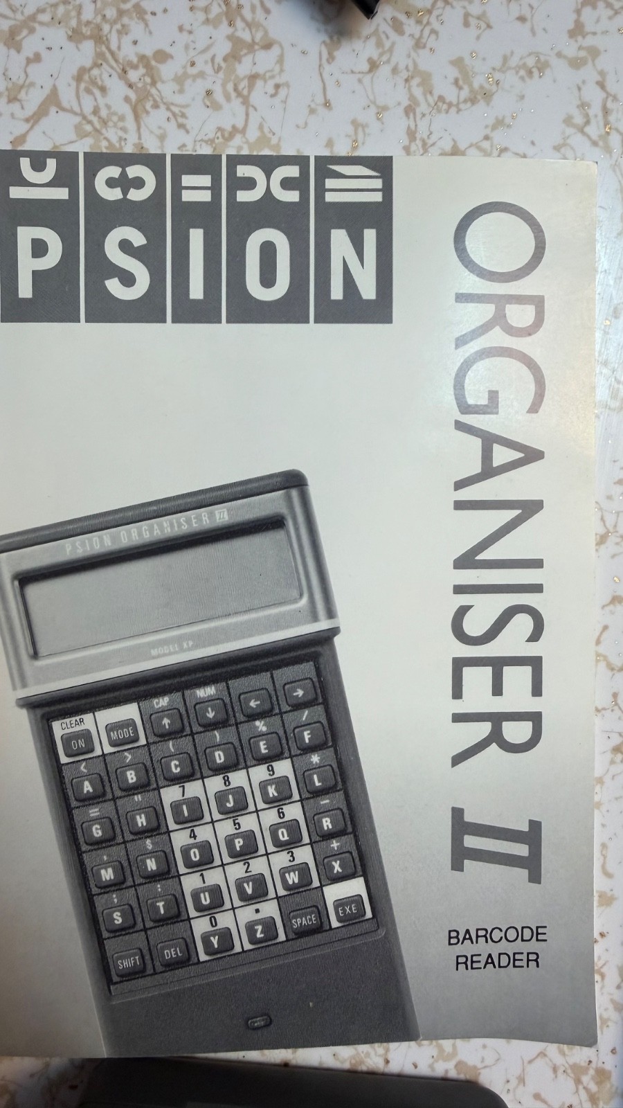 Psion Organiser II with powered comms link cable/charger 8K data pack