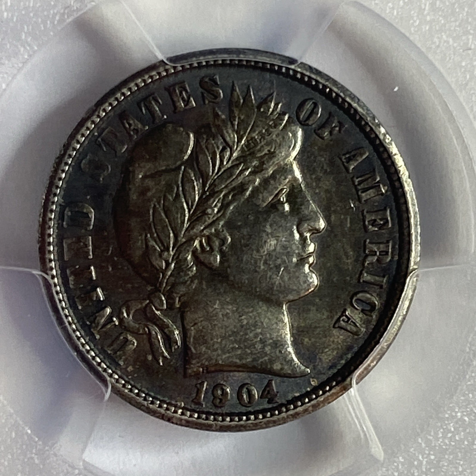 1904 BARBER DIME - PCGS AU-58