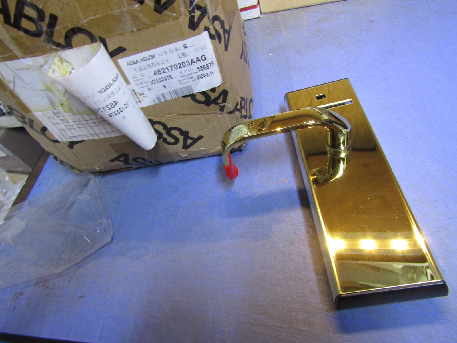 1 – Assa abloy Latch Lever Escutcheon with/card slot, Gold in color. NEW – Note: