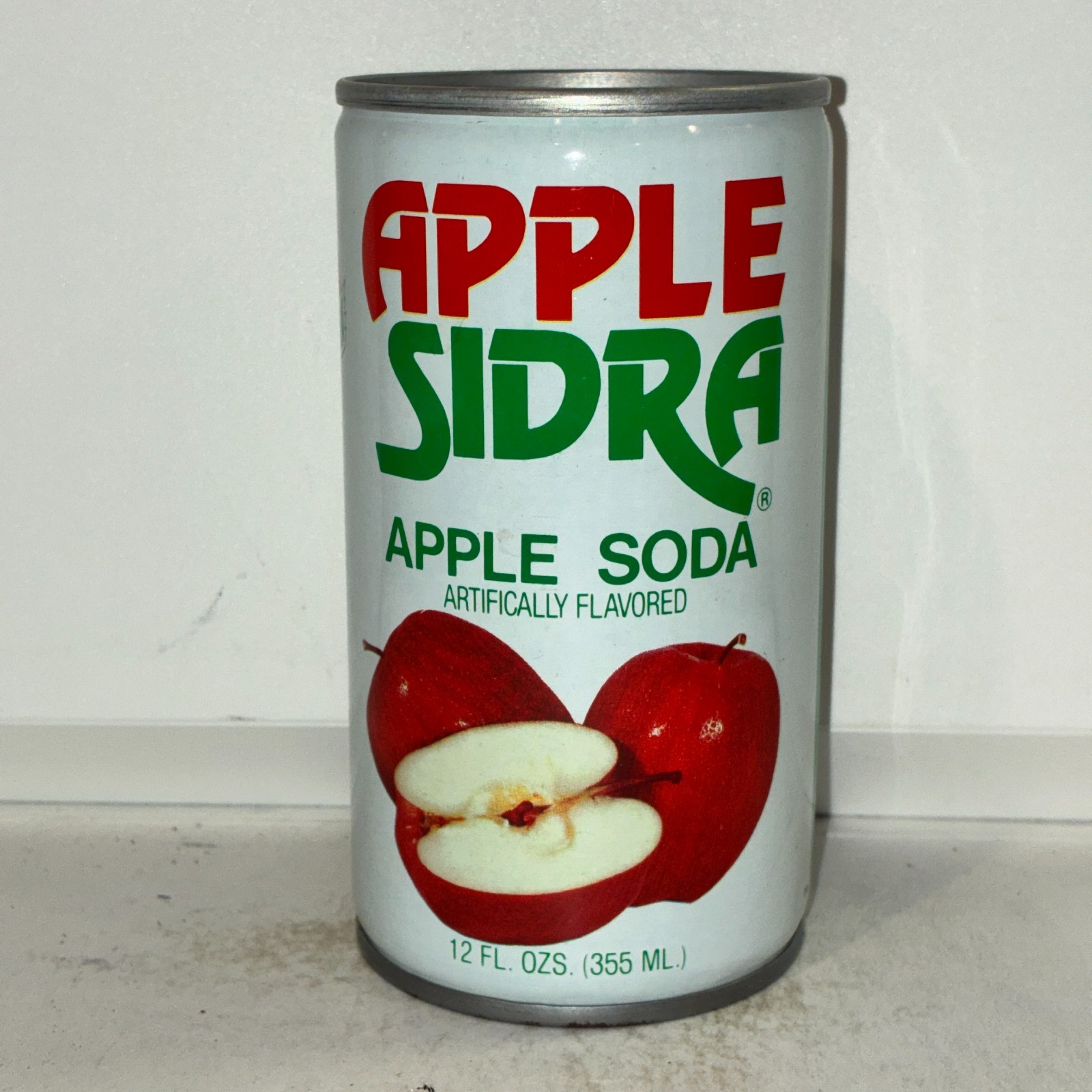 Apple Sidra apple soda can, bottom opened