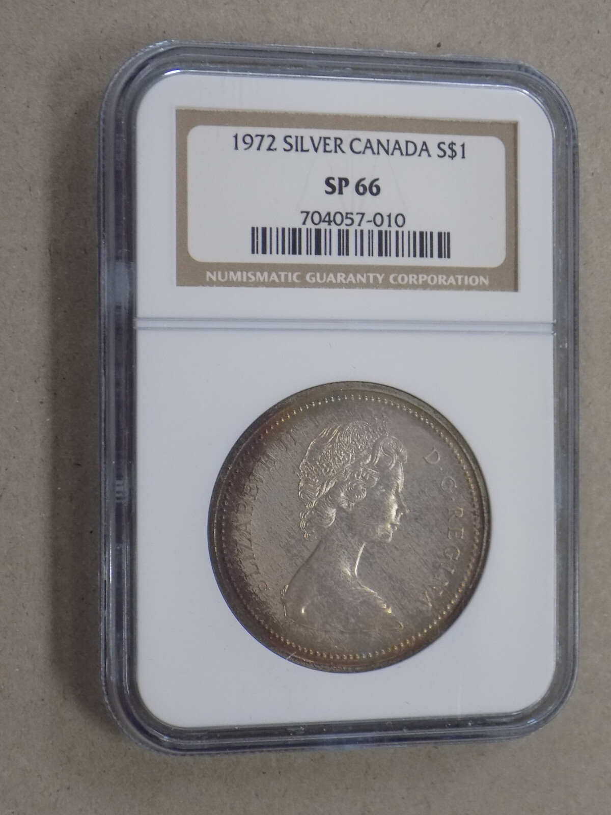 1972 $1 Canada Silver Dollar NGC SP66 Rainbow Toning