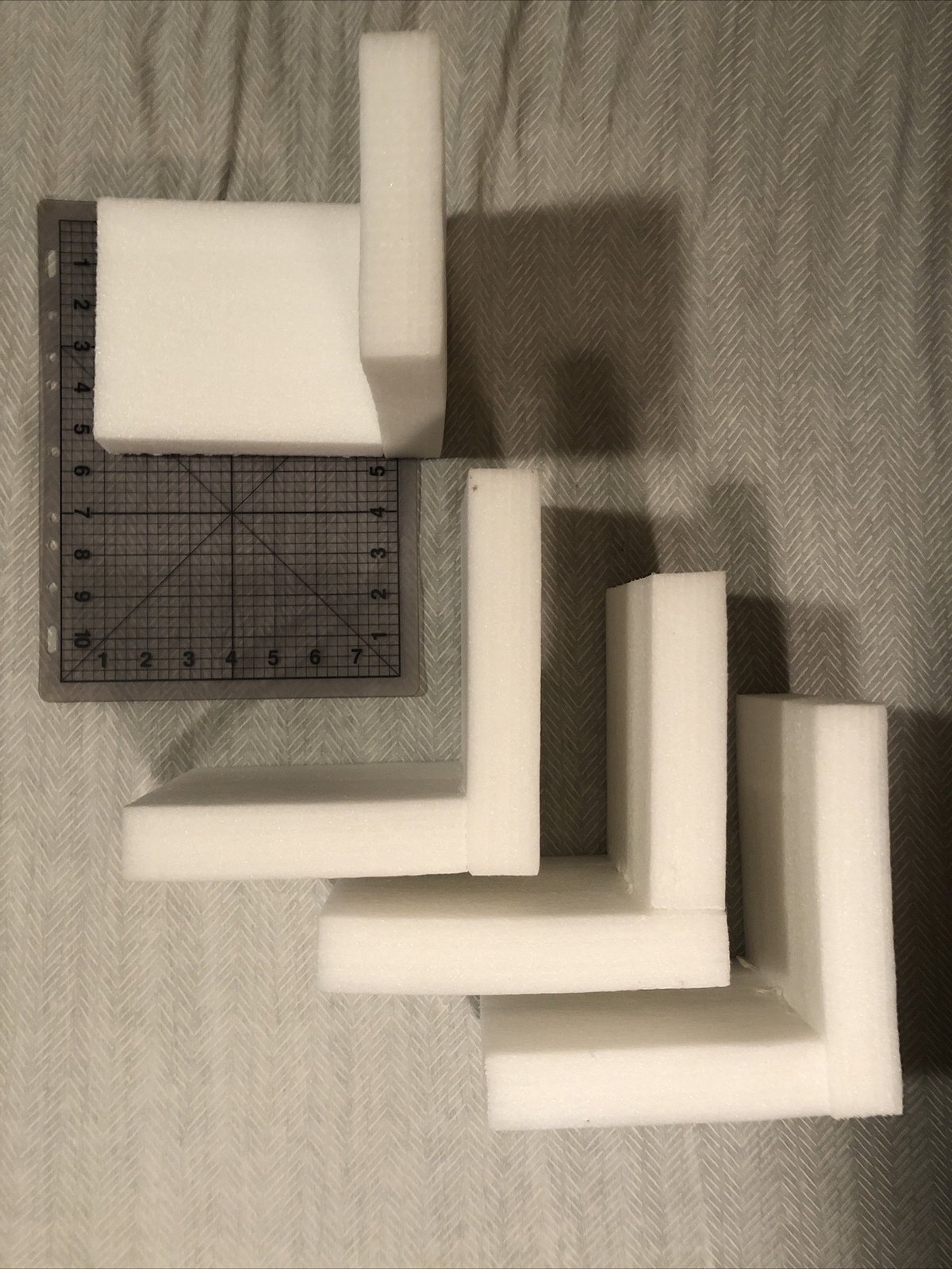 4 Corner Guards, Flexible Styrene packing material about 8x5.5” sides 1.5” thick